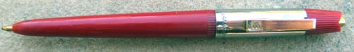 PARKER / EVERSHARP BIG 'E' SHORT BALLPOINT IN RED W/ CHROME TRIM. These have the Eversharp name on the front of the cap and the Big E on the clip. Turn them around and they have the Parker Elipse/Arrow and name on the back of the cap.